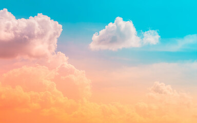 Naklejka na ściany i meble orange and pink clouds in blue sky with clouds