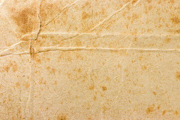 old weathered brown paper texture with creases