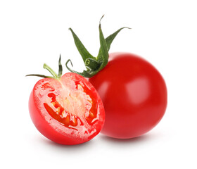 Whole and cut fresh tomatoes on white background
