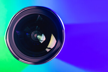 The camera lens and the beautiful multi-colored gradient color. Optics.