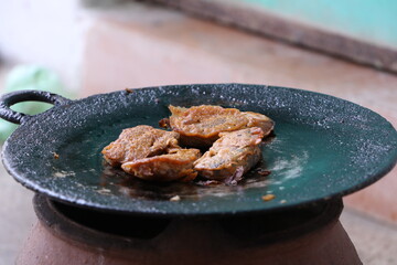 close up of a pot with meat and vegetables