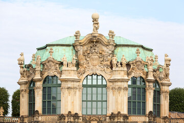 Fototapeta na wymiar Dresden, Germany - September 23, 2020 : 18th century baroque Zwinger Palace, decorative ornaments on the facade of the Wall Pavilion