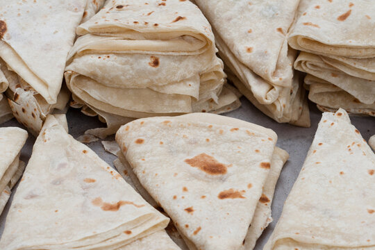 Many Indian flat bread Rumali roti, Lamboo roti made of whole wheat flour or Maida and baked, Jaipur Rajasthan India. chapathi, fulka, paratha , roti served with side dish dal curry. 