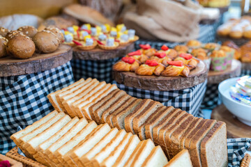 Assortment of fresh bread on table in buffet