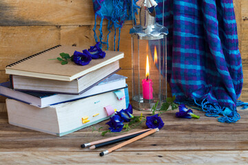 dictionary book for study with blue scarf ,lamplight of lifestyle woman in winter season decoration...