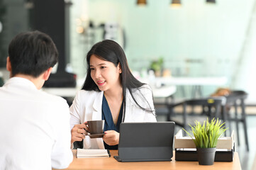 Startup diversity teamwork brainstorming together in modern office.