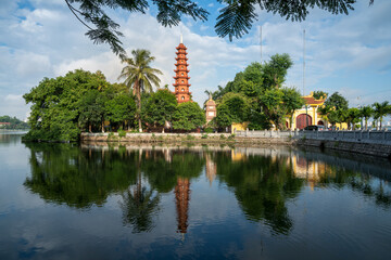 Fototapeta na wymiar Tran Quoc pagoda in the morning, the oldest temple in Hanoi, Vietnam. Hanoi cityscape.