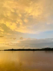 Foto op Canvas sunset over the river © Gurudas