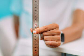 Woman Testing Reaction Time Using Ruler
