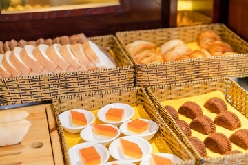 Assortment of fresh pastry on table in buffet