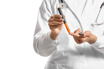 Doctor with lancet pen taking blood sample on white background. Diabetes concept