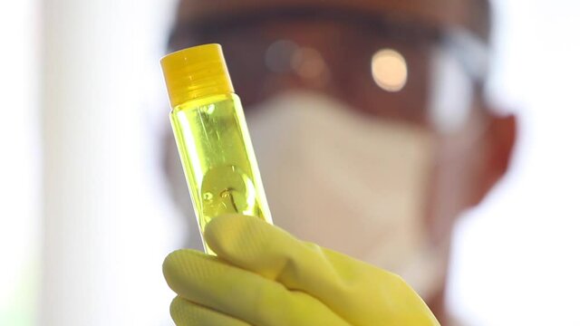 Researcher working in pharmaceutical industry lab, vaccine trial, coronavirus