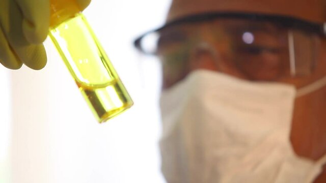 Researcher working in pharmaceutical industry lab, vaccine trial, coronavirus