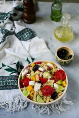Greek salad with pasta.  .selective focus