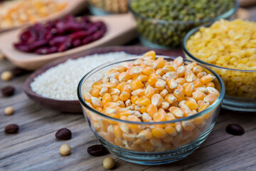 Corn in blow on a wood table background. corn seeds in blow 
