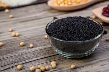 Dry sweet basil seed in  bowl. Sweet basil seed in small bowl.  Black sesame in bowl. Dried black sesame seeds in the plate.