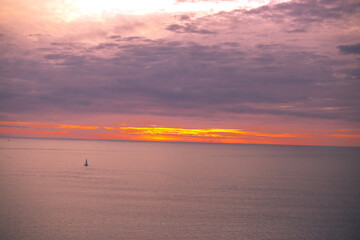 Blurred abstract background from high angle from plane window, overlooking the scenery below (river, mountain, tree).
