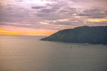 Fototapeta premium Blurred abstract background from high angle from plane window, overlooking the scenery below (river, mountain, tree).