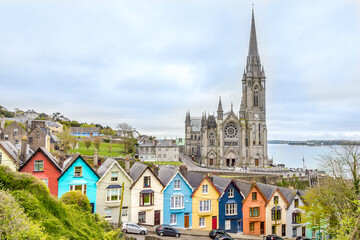 View of the Cathedral  and colored houses in Cobh, Ireland