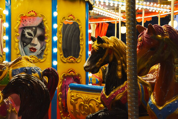 Carousel horses in an Amusement Park at Night Time