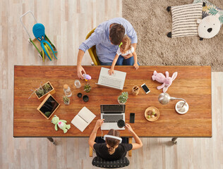 Work from home, dad play with his baby, mom is working hard at home style up concept.