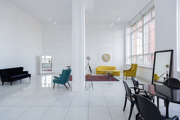 modern fashionable futuristic interior design of a spacious white hall with black and yellow furniture