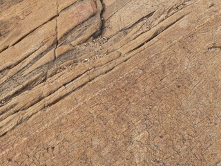 Natural background of rock in riverside india.  Stones texture and background. Rock texture. Rock fragment. Abstract background. A fragment of rock. 