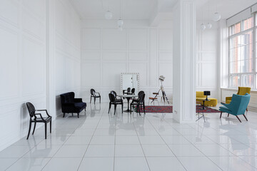 modern fashionable futuristic interior design of a spacious white hall with black and yellow furniture