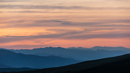 Mongolia Steppe during Sunset with Orange Clouds