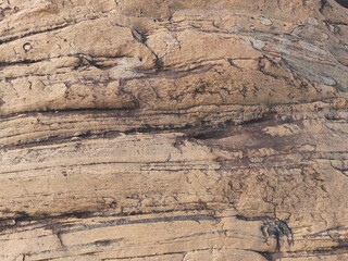 Natural background of rock in riverside india.  Stones texture and background. Rock texture. Rock fragment. Abstract background. A fragment of rock. 