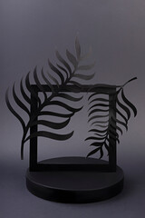 Luxury square podium with palm leaves and frames on black background. Concept scene stage showcase, for product, promotion, sale, banner, presentation, cosmetic. Minimal showcase mock up concept.