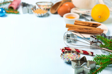Ingredients for Christmas baking - flour, spices, eggs and cookie cutters.