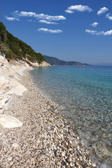 Beautiful turquoise paradise secluded pebble beach of Gidaki only accessible by path, Ithaki or Ithaca island, Ionian, Greece