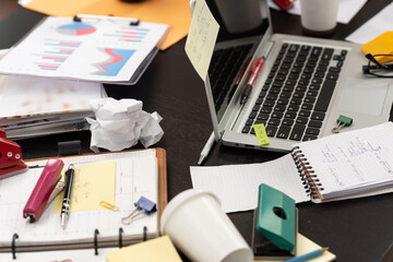 Messy and cluttered desk