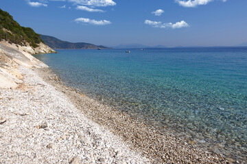 Fototapeta na wymiar Beautiful turquoise paradise secluded pebble beach of Gidaki only accessible by path, Ithaki or Ithaca island, Ionian, Greece