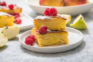 Piece of fresh baked homemade layered apple pie.