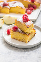 Piece of fresh baked homemade layered apple pie.