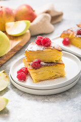 Piece of fresh baked homemade layered apple pie.