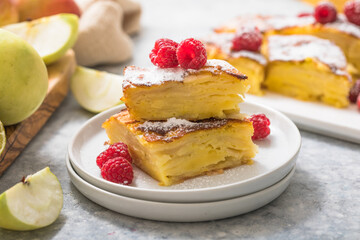 Piece of fresh baked homemade layered apple pie.