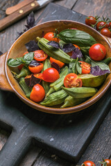Traditional healthy organic Turkish food Okra with tomato  and olive oil. Ready to eat.
