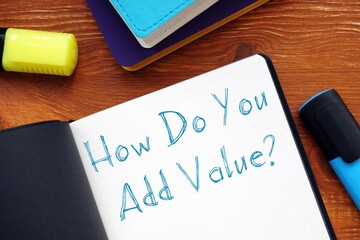 How Do You Add Value? phrase on the piece of paper.