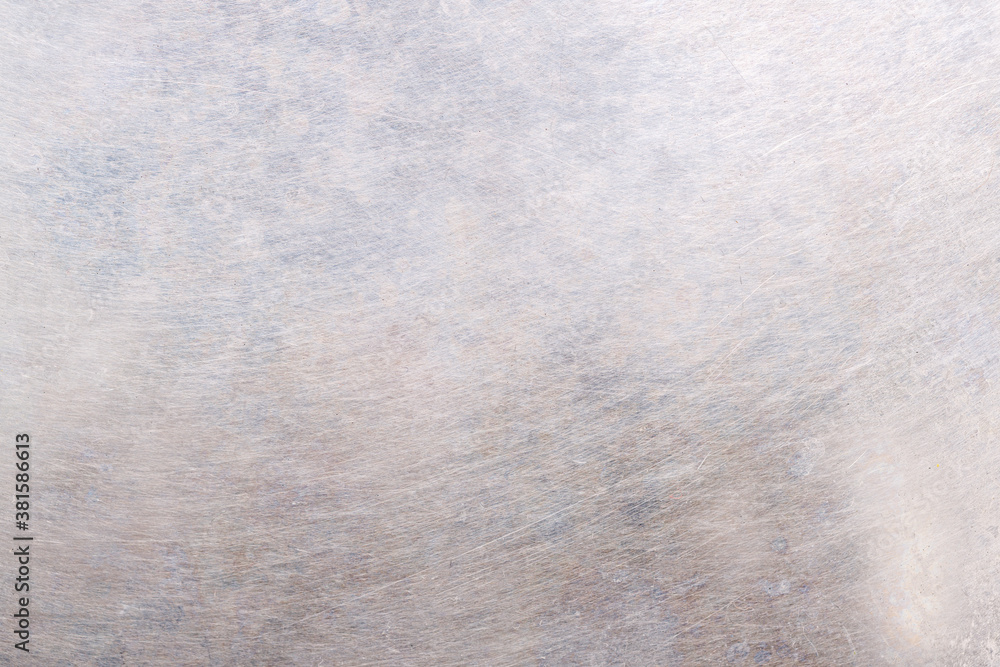 Poster metallic seribrous surface with scratches. background for designer