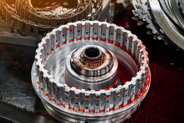 automatic transmission and clutch fabric on the workshop table.