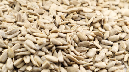 Sunflower seeds, peeled, without shell. Background of peeled not roasted seeds.