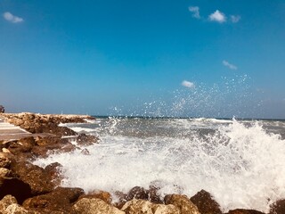 waves crashing on rocks