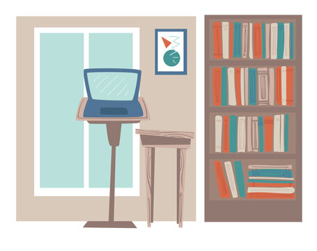 Office or home workplace with laptop and books