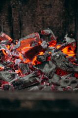 Hot red coals in the grill
