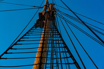 Fototapeta premium Rope ladder leading up the mast of an vintage wooden tall ship.
