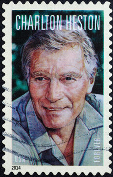 Portrait of Charlton Heston on american postage stamp