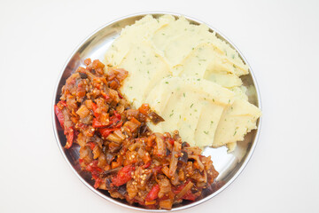 Plate with mashed potatoes and vegetable ragout